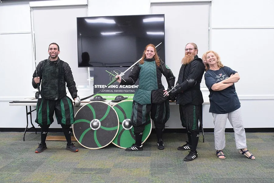 Steel Ring Instructors with Braden River Library staff prior to a Summer Reading Program demonstration