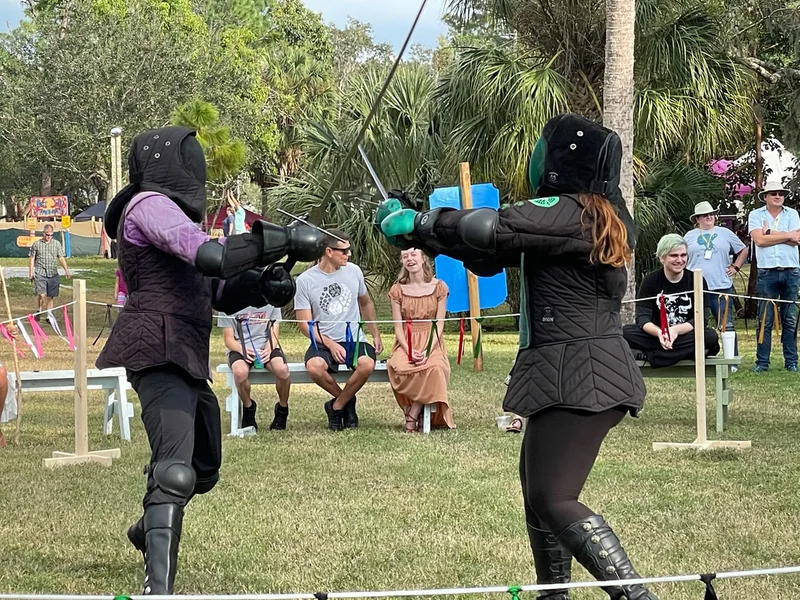 Steel Ring Academy instructor Amanda and Billy in a longword bind  at the Suncoast Renaissance Festival.