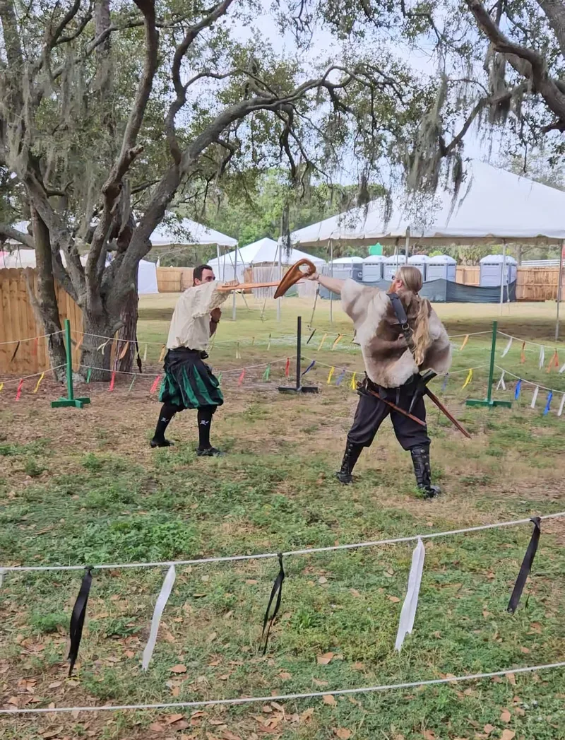 Jason and Chris drilling with leather dussack trainers at the Suncoast Renaissance Festival.